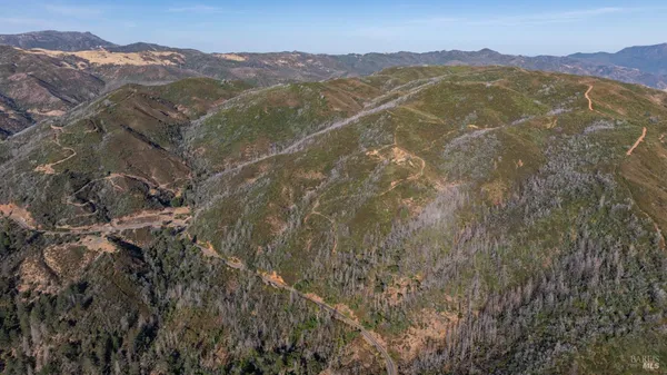a view of a street with an outdoor space