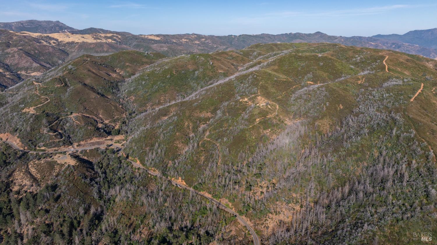 7051 Geysers Road Geyserville, CA 95441 - Photo 7 of 21 a view of a mountain with a mountain in the background