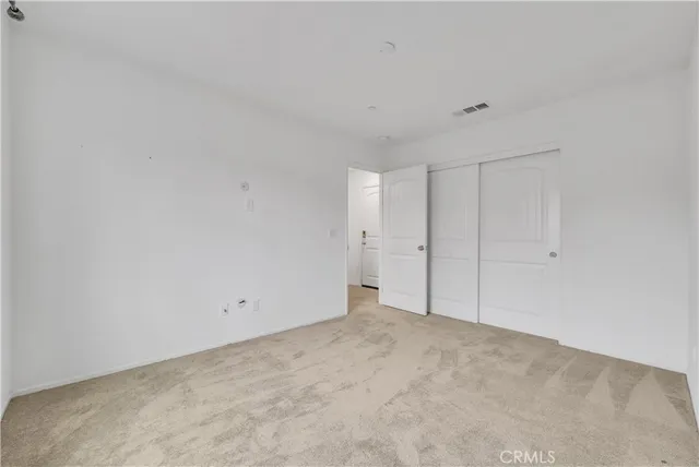 a room with furniture and wall painting