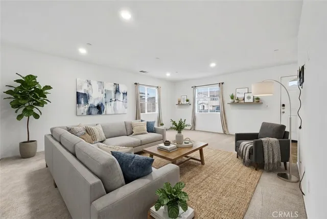 a kitchen with granite countertop stainless steel appliances a sink stove and cabinets