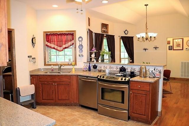 Large open kitchen with Stainless Applia