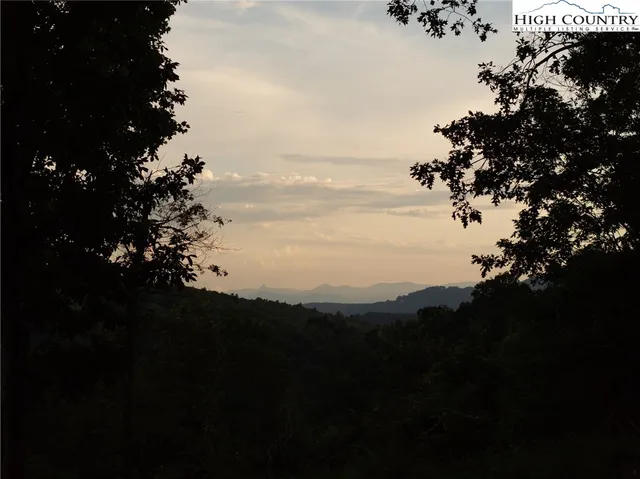 a view of lake with mountain