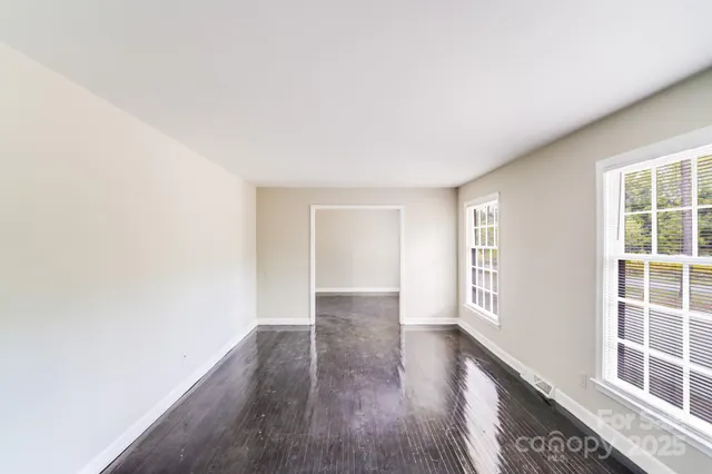 an empty room with windows