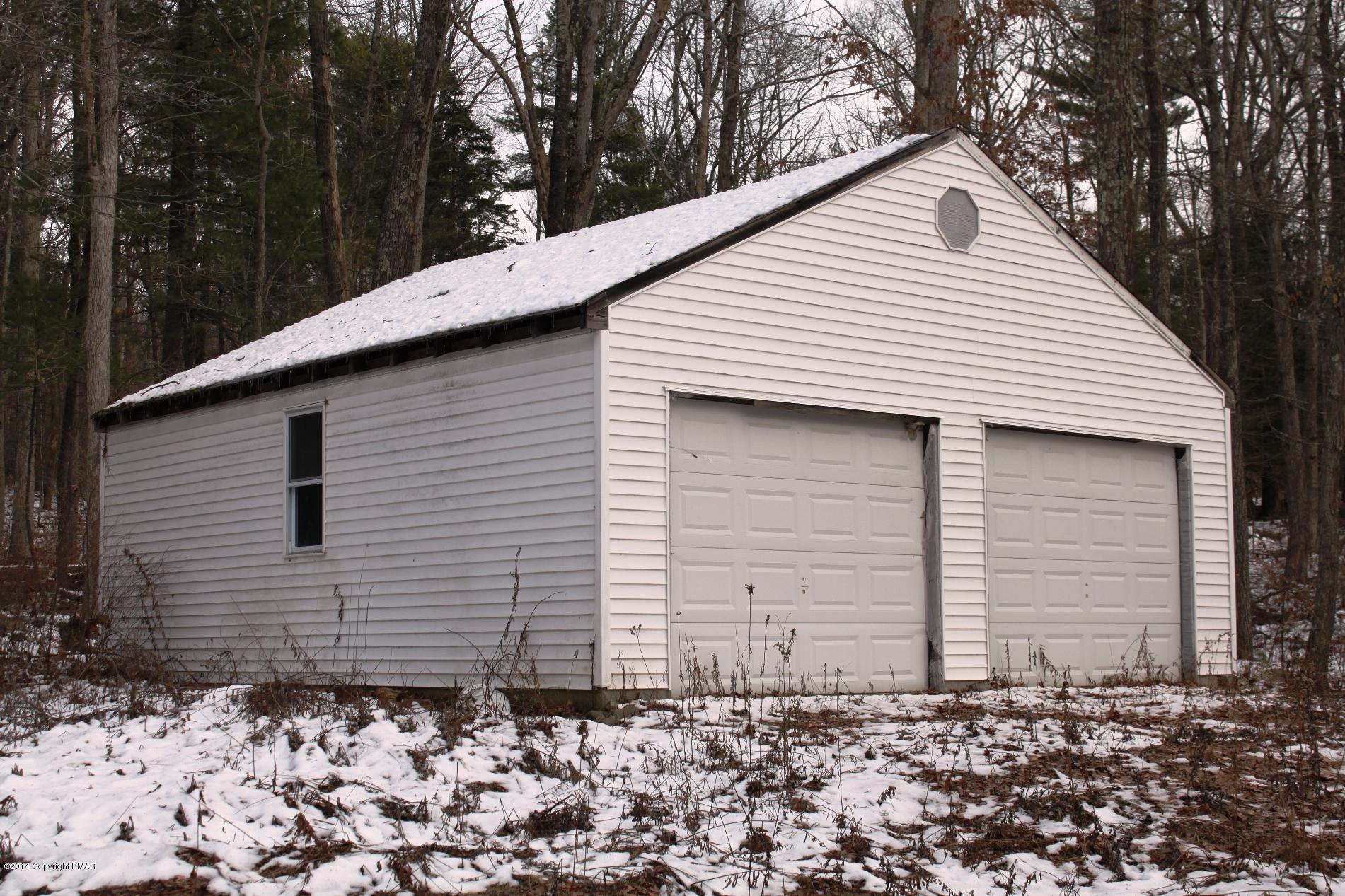 1055 Bush Road Cresco, PA 18326 - Photo 21 of 24 a front view of a house