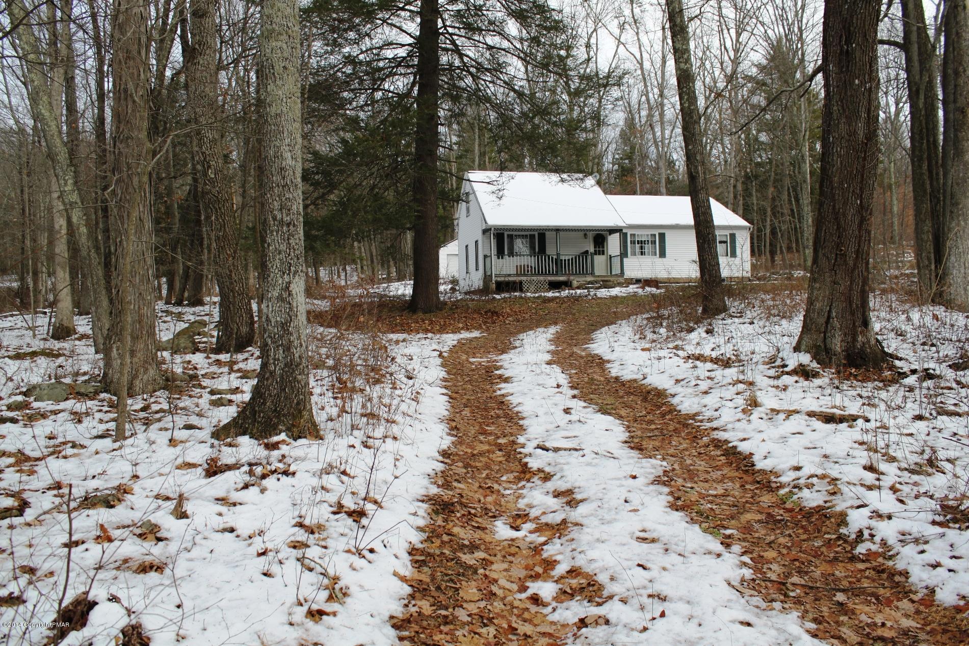 1055 Bush Road Cresco, PA 18326 - Photo 23 of 24 a view of a house with a yard