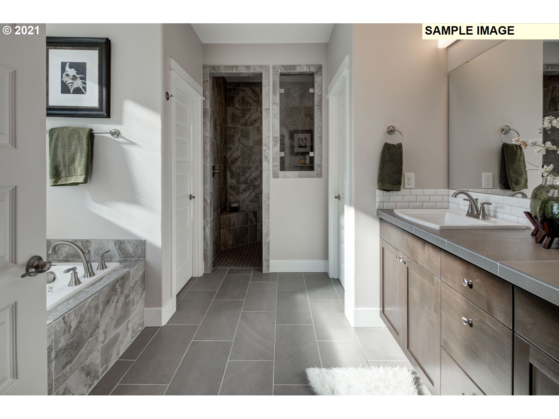 South Cherry Grove Way Ridgefield, WA 98642 - Photo 12 of 32 a bathroom with a sink and a mirror