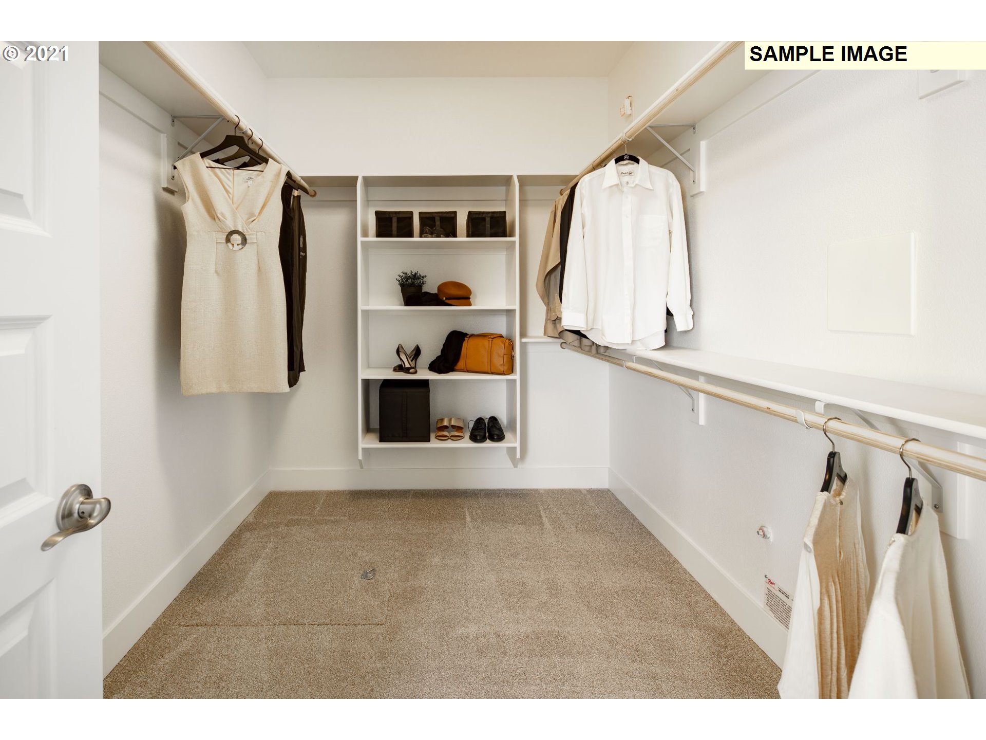 South Cherry Grove Way Ridgefield, WA 98642 - Photo 15 of 32 a view of walk in closet with clothes and shoes