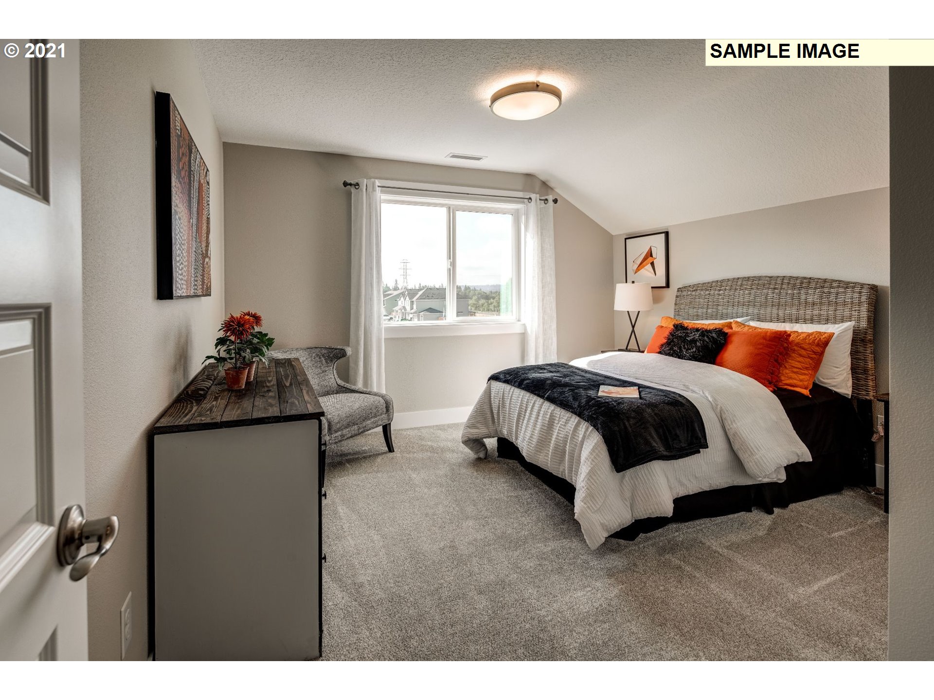 South Cherry Grove Way Ridgefield, WA 98642 - Photo 17 of 32 a bedroom with a bed and window