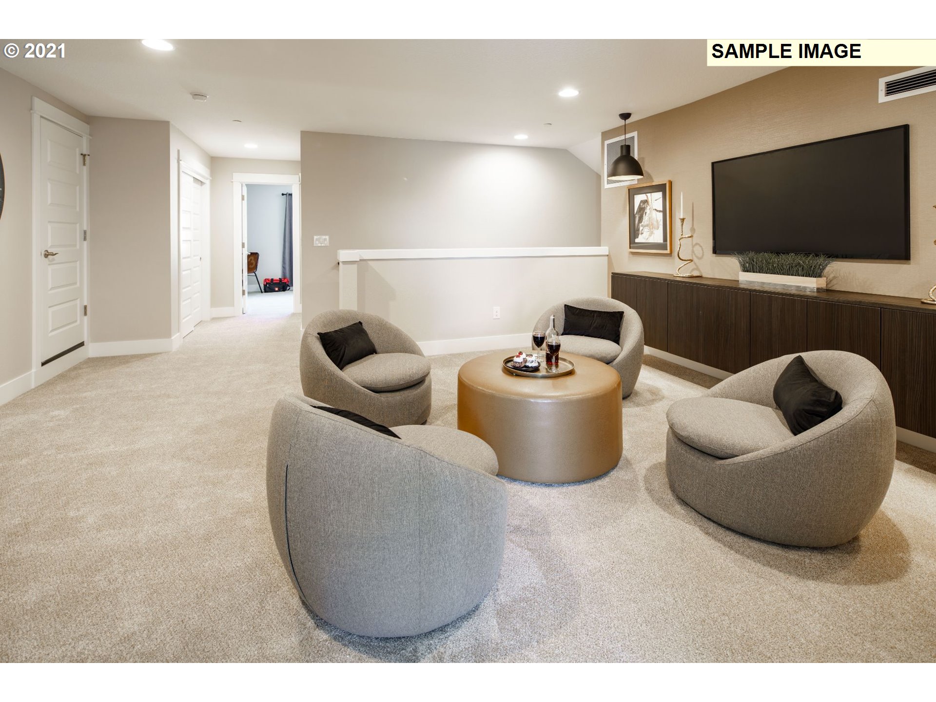 South Cherry Grove Way Ridgefield, WA 98642 - Photo 18 of 32 a living room with furniture and a flat screen tv