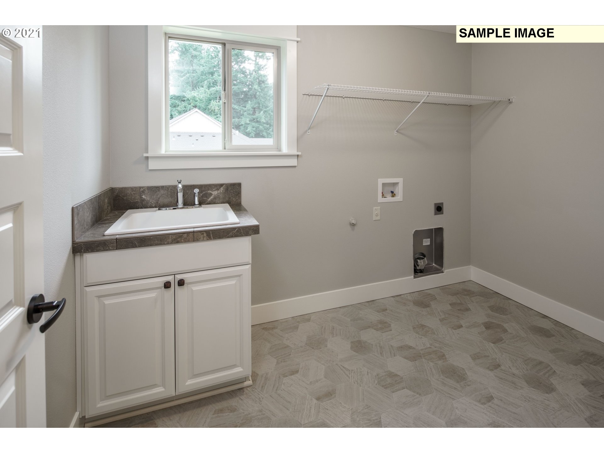 South Cherry Grove Way Ridgefield, WA 98642 - Photo 31 of 32 a bathroom with a sink and vanity