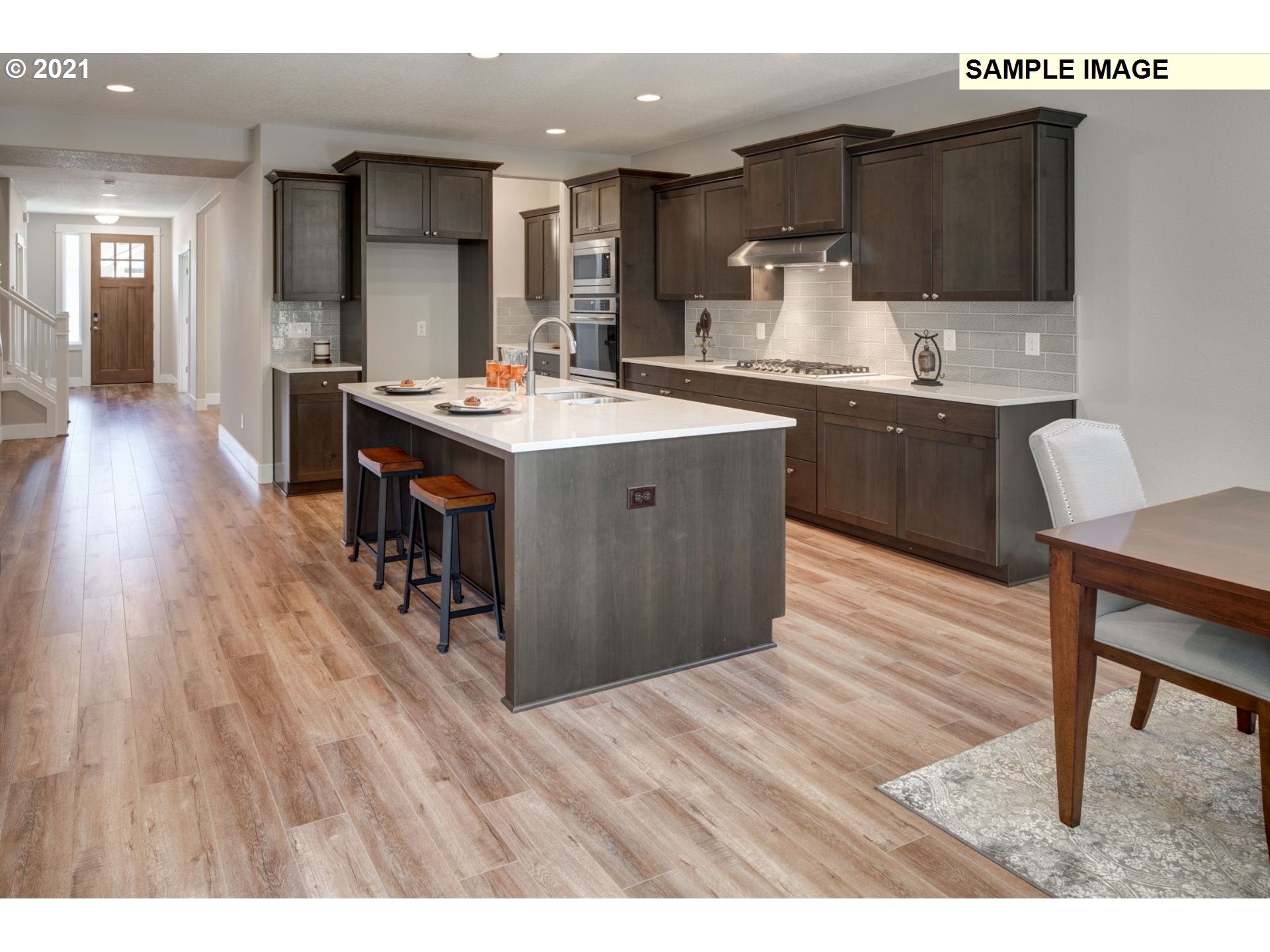 South Cherry Grove Way Ridgefield, WA 98642 - Photo 10 of 32 a kitchen with a sink appliances and cabinets