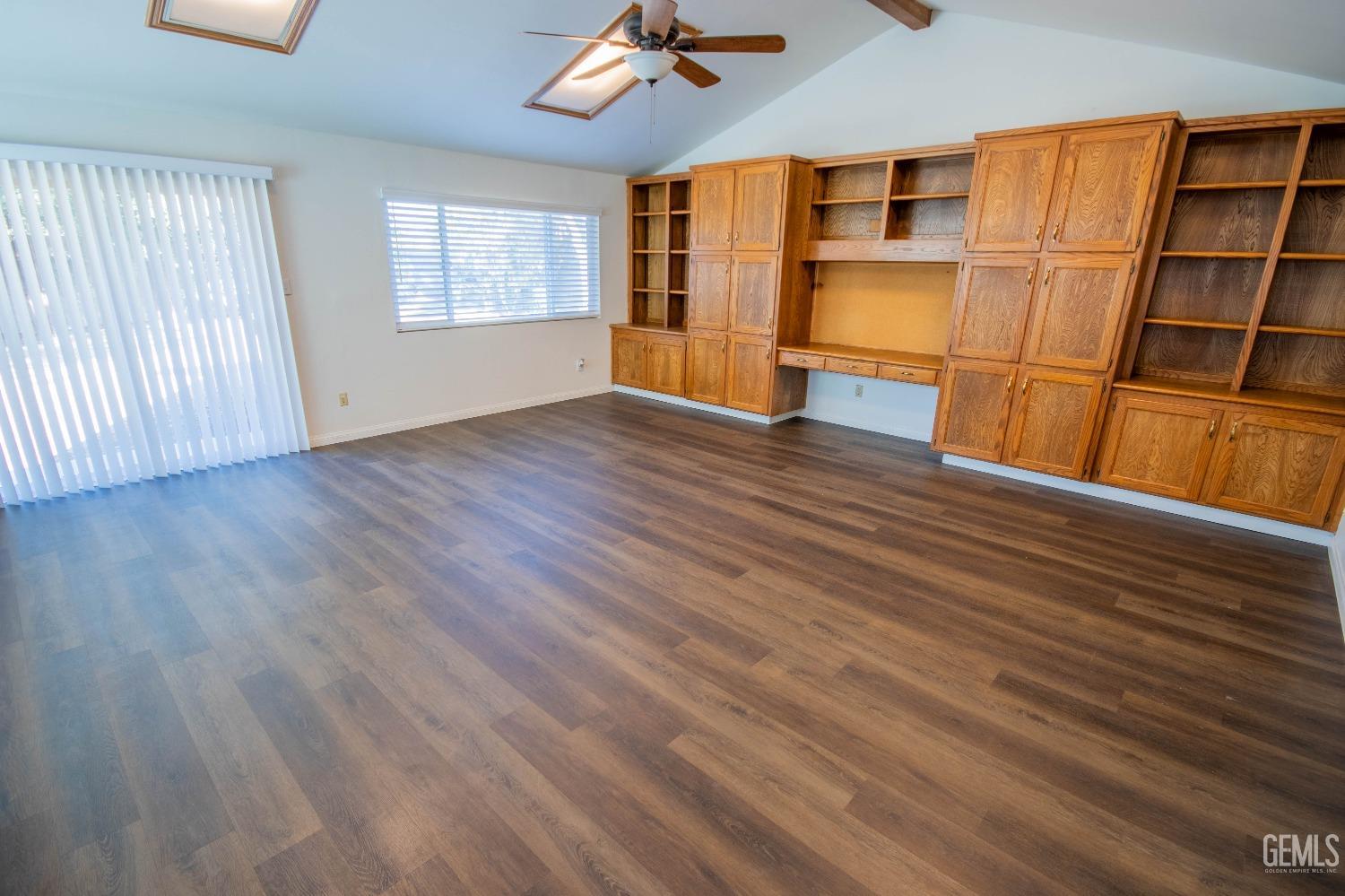 Undisclosed Address Bakersfield, CA 93309 - Photo 18 of 39 wooden floor in an empty room with a window
