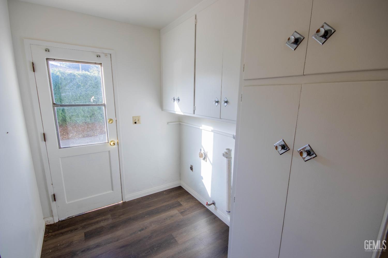 Undisclosed Address Bakersfield, CA 93309 - Photo 27 of 39 a view of a room with wooden floor