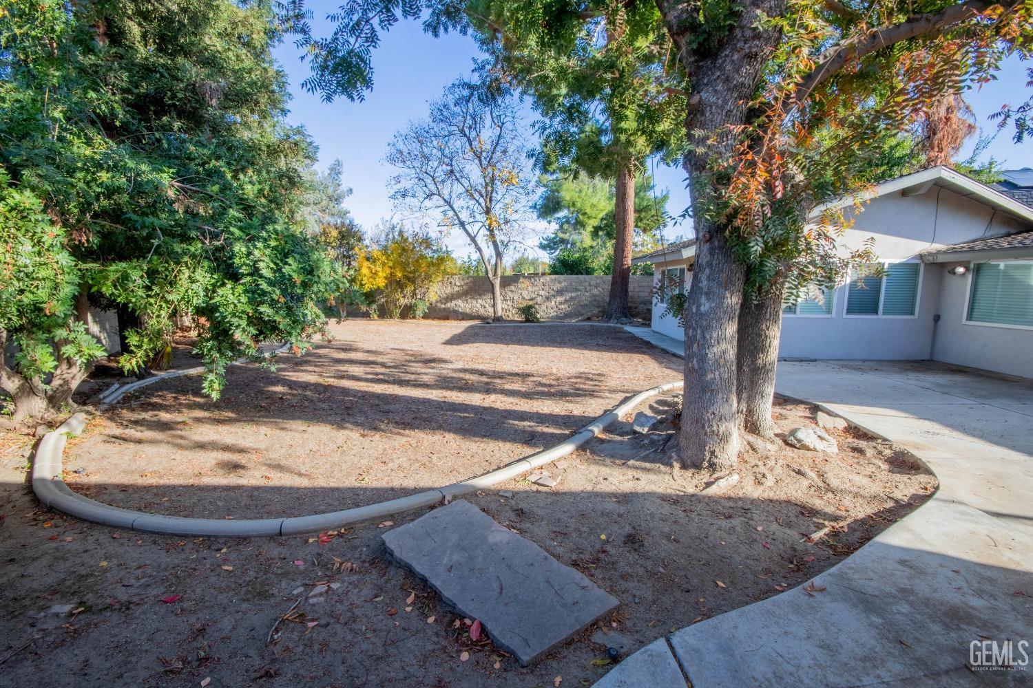 Undisclosed Address Bakersfield, CA 93309 - Photo 28 of 39 a view of a backyard of the house