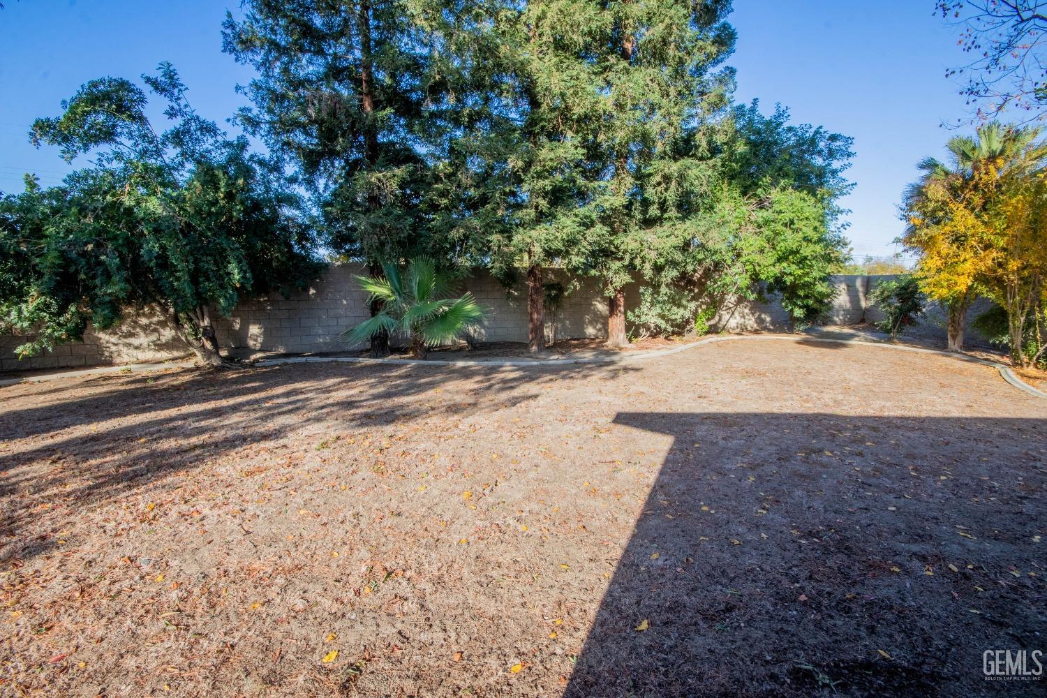 Undisclosed Address Bakersfield, CA 93309 - Photo 32 of 39 a view of a backyard of a house