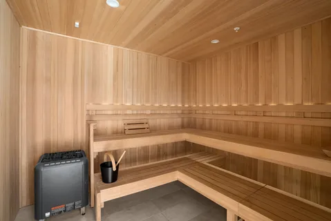 a bathroom with a sink toilet shower and a mirror