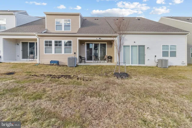 a view of a house with a garden