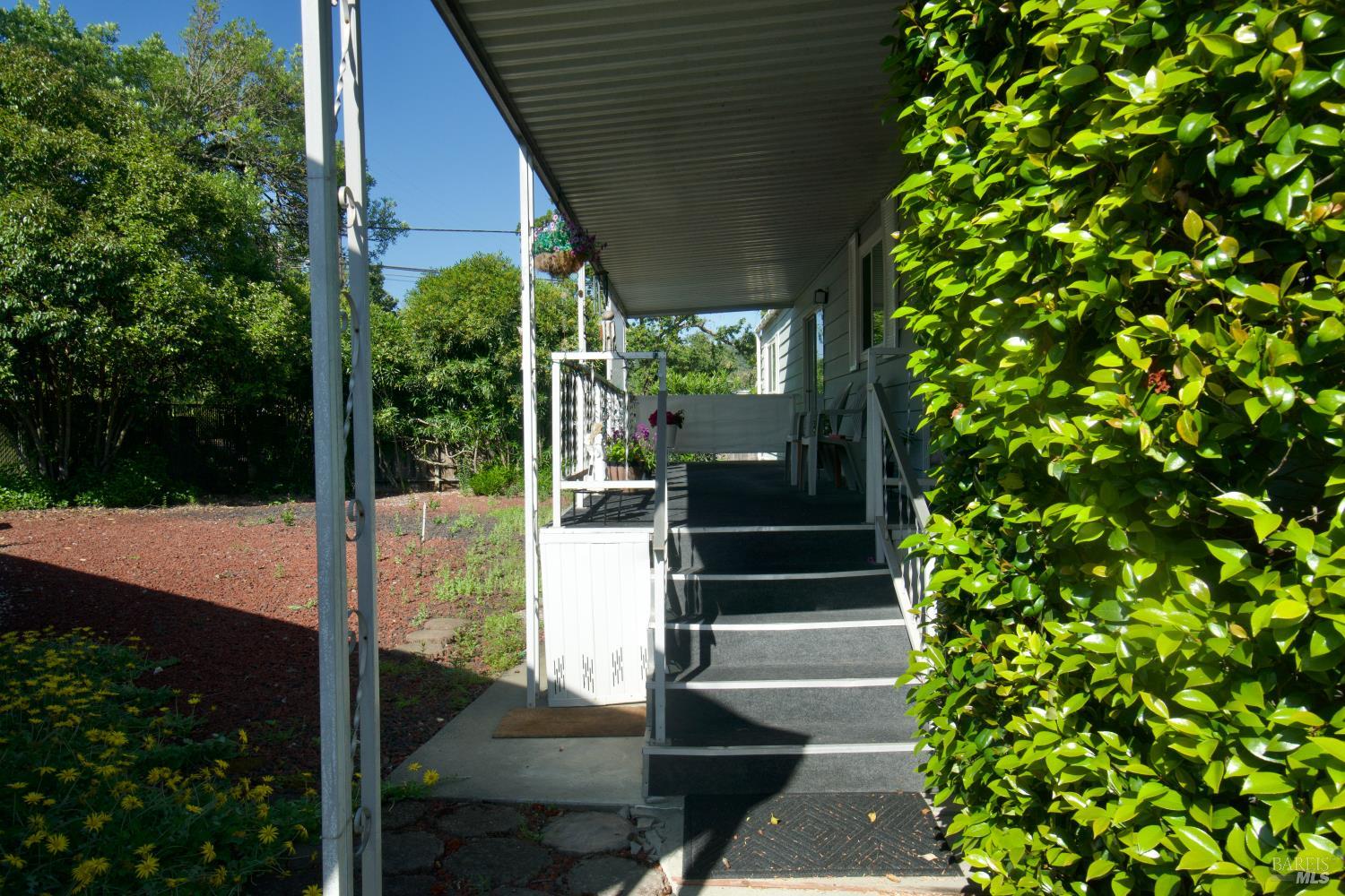 41 Plymouth Way Santa Rosa, CA 95403 - Photo 1 of 28 Walk up the front steps to the front deck and front door.
