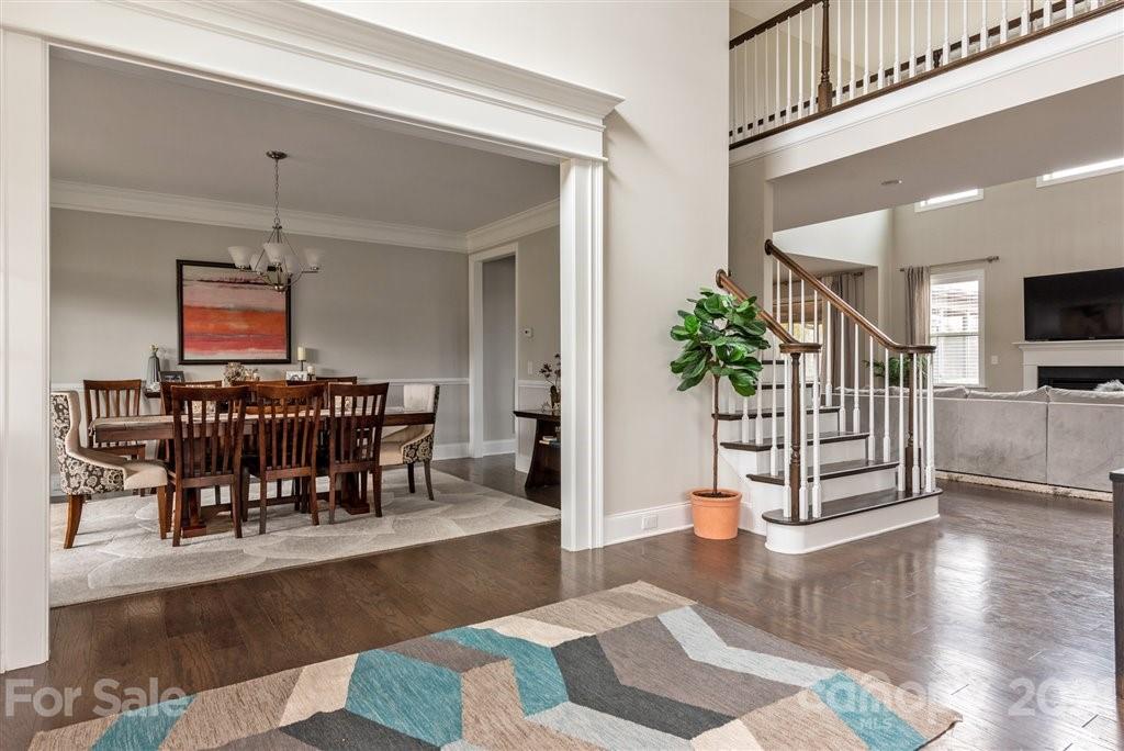 4000 Flowering Peach Road Marvin, NC 28173 - Photo 2 of 48 a living room with furniture and wooden floor