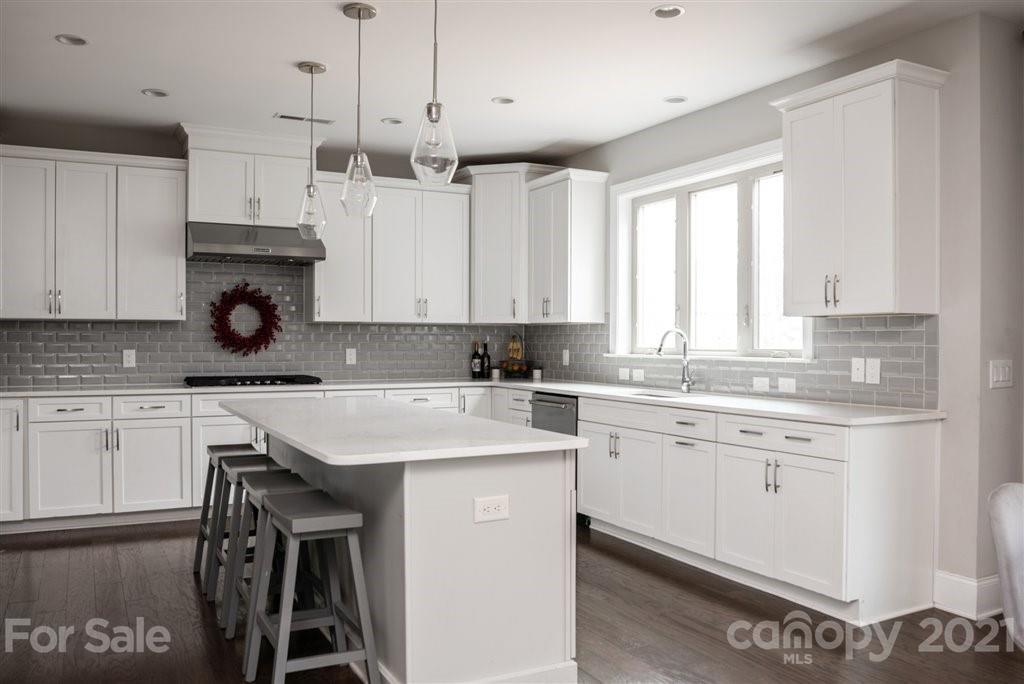 4000 Flowering Peach Road Marvin, NC 28173 - Photo 12 of 48 a kitchen with a sink window and cabinets