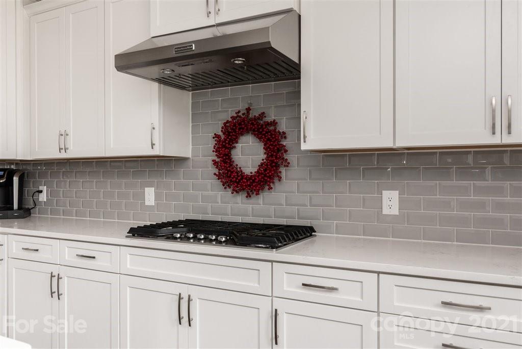 4000 Flowering Peach Road Marvin, NC 28173 - Photo 14 of 48 a kitchen with a stove and cabinets
