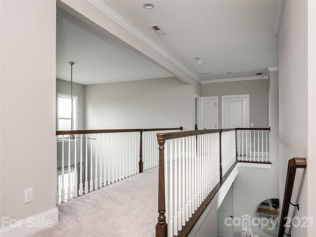 4000 Flowering Peach Road Marvin, NC 28173 - Photo 20 of 48 a view of a hallway with windows