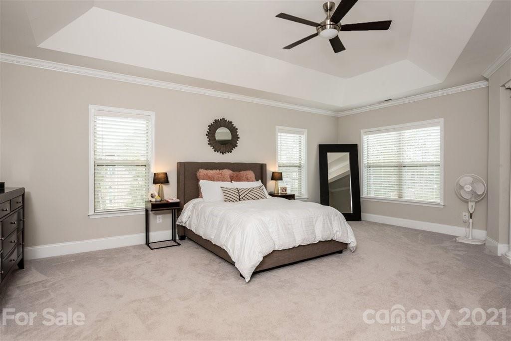 4000 Flowering Peach Road Marvin, NC 28173 - Photo 22 of 48 a spacious bedroom with a bed and window
