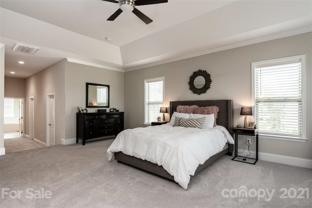 4000 Flowering Peach Road Marvin, NC 28173 - Photo 23 of 48 a bedroom with a bed dresser and a window