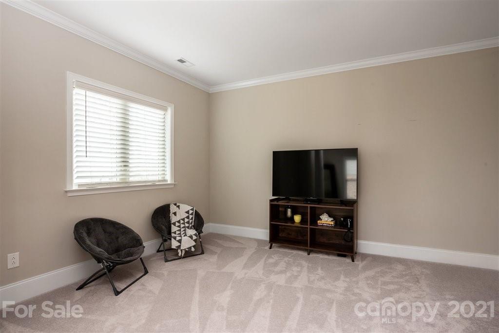 4000 Flowering Peach Road Marvin, NC 28173 - Photo 24 of 48 a living room with furniture and a window