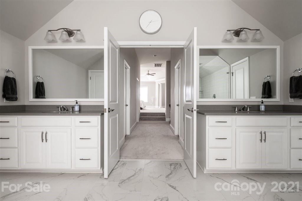 4000 Flowering Peach Road Marvin, NC 28173 - Photo 27 of 48 a bathroom with a sink and a mirror