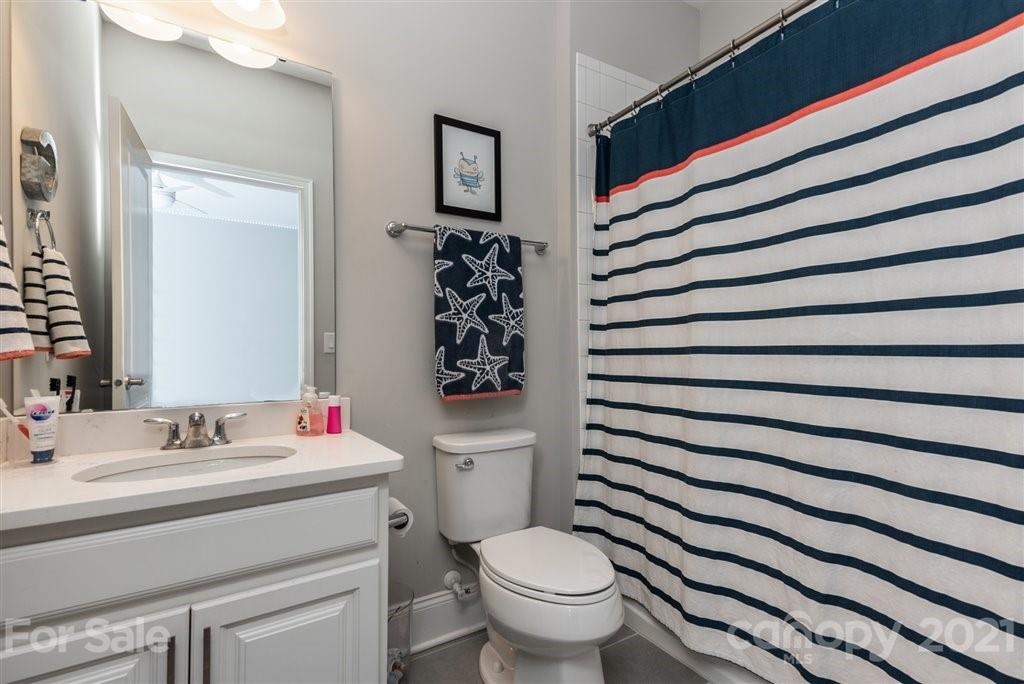 4000 Flowering Peach Road Marvin, NC 28173 - Photo 32 of 48 a bathroom with a sink toilet and shower
