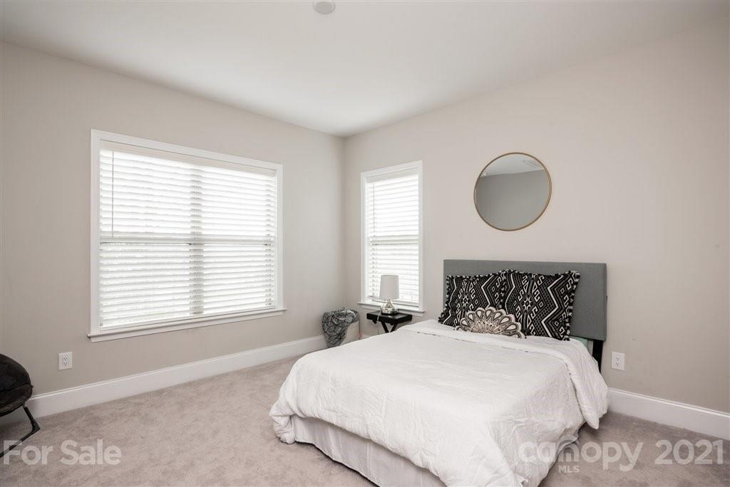 4000 Flowering Peach Road Marvin, NC 28173 - Photo 33 of 48 a bedroom with a bed and a window