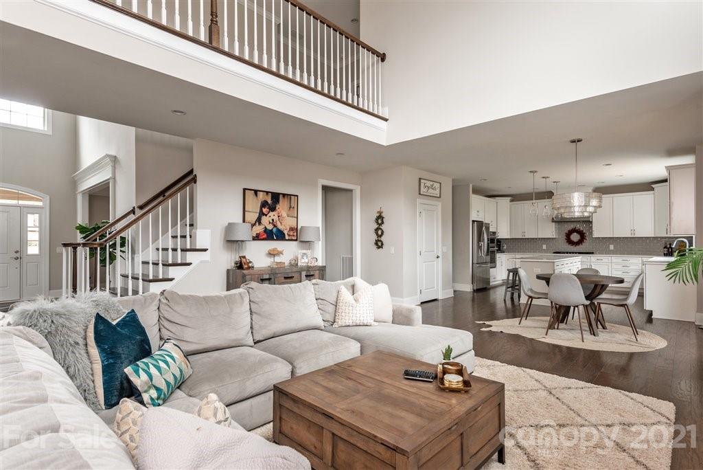 4000 Flowering Peach Road Marvin, NC 28173 - Photo 10 of 48 a living room with furniture and kitchen view
