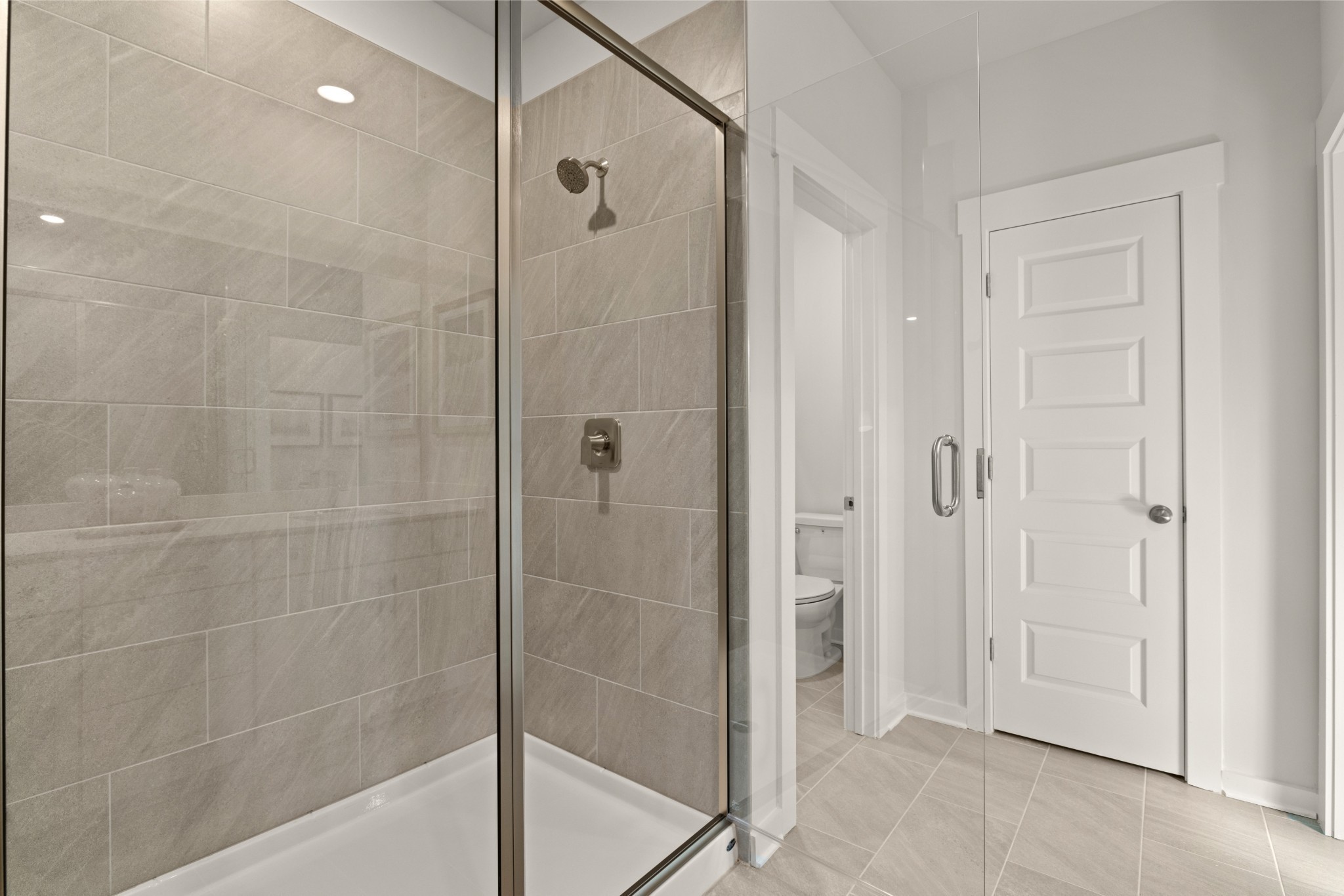 481 Mclemore Ridge Clarksville, TN 37043 - Photo 65 of 66 a bathroom with a shower and a glass door