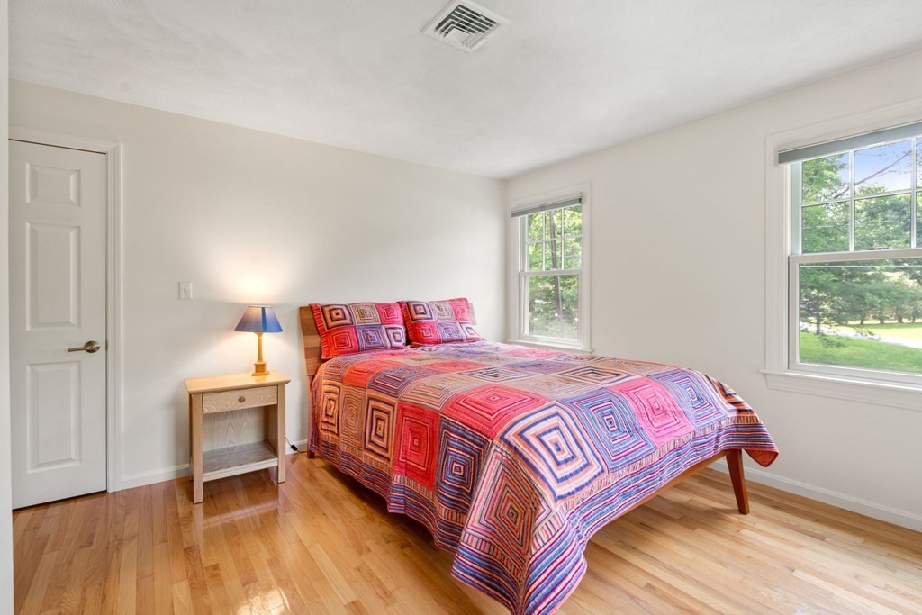 45 Upson Road Wellesley, MA 02482 - Photo 20 of 37 a bedroom with a bed and a window