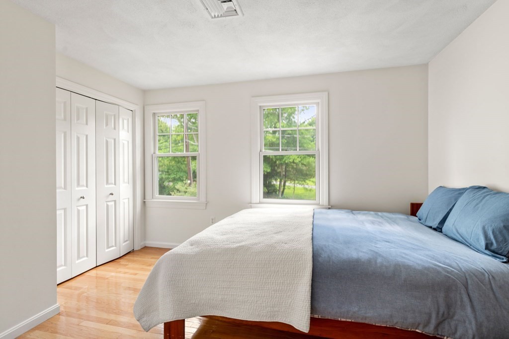 45 Upson Road Wellesley, MA 02482 - Photo 21 of 37 a bedroom with a bed and a window