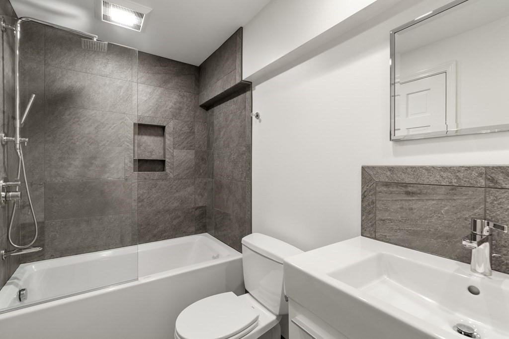 45 Upson Road Wellesley, MA 02482 - Photo 26 of 37 a bathroom with a sink toilet and bathtub