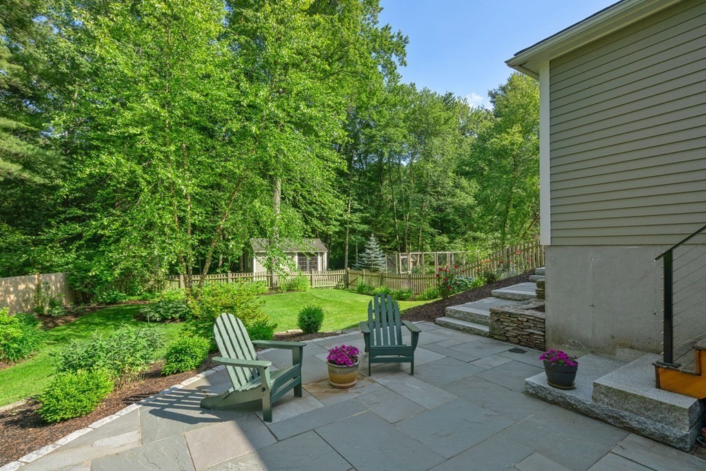45 Upson Road Wellesley, MA 02482 - Photo 28 of 37 a view of backyard with outdoor seating and green space