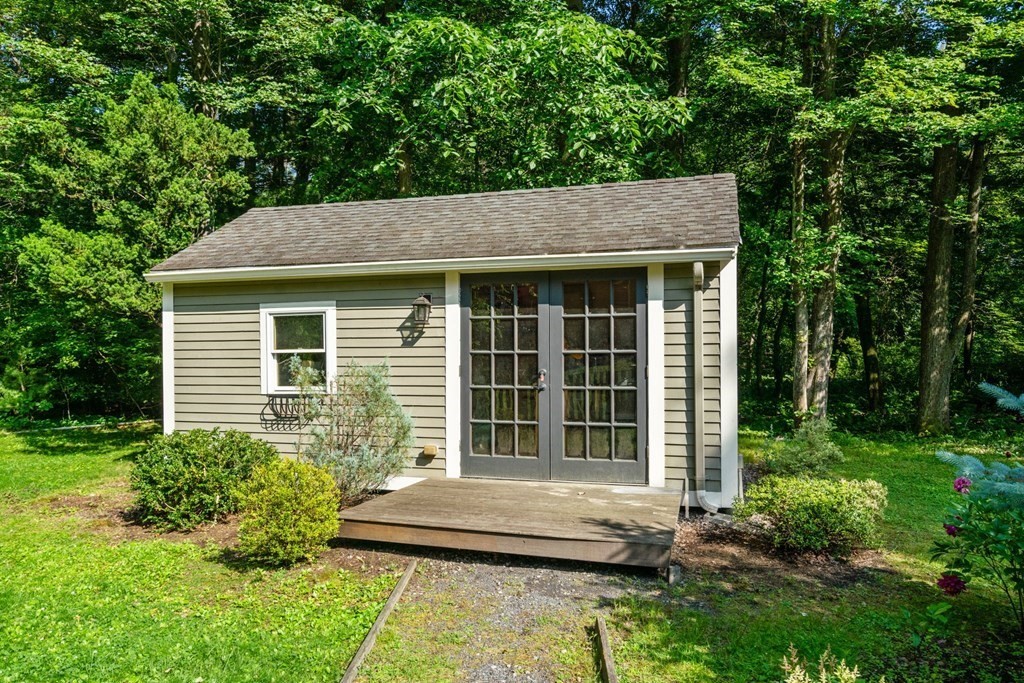 45 Upson Road Wellesley, MA 02482 - Photo 30 of 37 a front view of a house with a yard