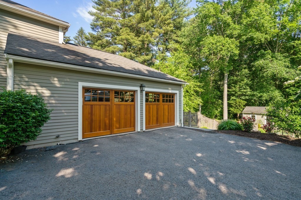 45 Upson Road Wellesley, MA 02482 - Photo 31 of 37 a view of a house with a yard and large tree