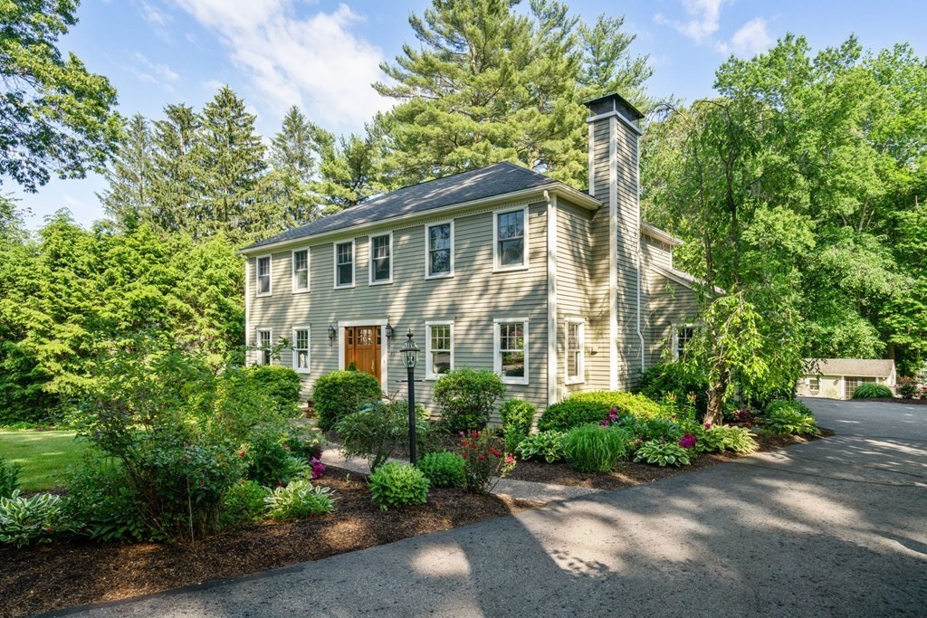45 Upson Road Wellesley, MA 02482 - Photo 37 of 37 front view of a house with a garden