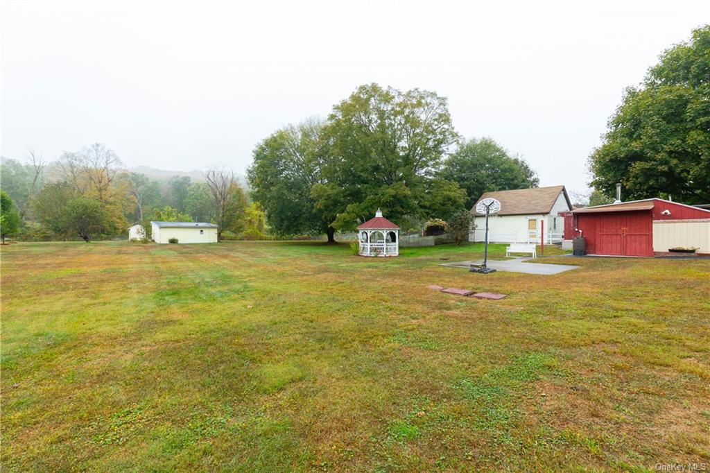 1030 Highway 199 Red Hook, NY 12571 - Photo 23 of 30 View of yard with an outbuilding
