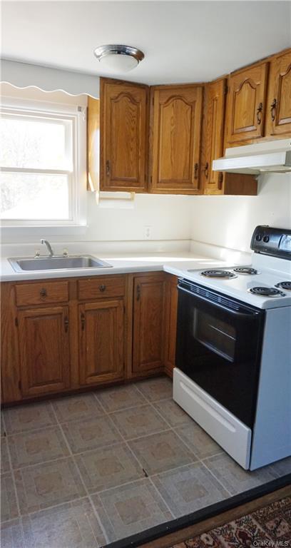 1030 Highway 199 Red Hook, NY 12571 - Photo 27 of 30 Kitchen featuring white electric stove and sink