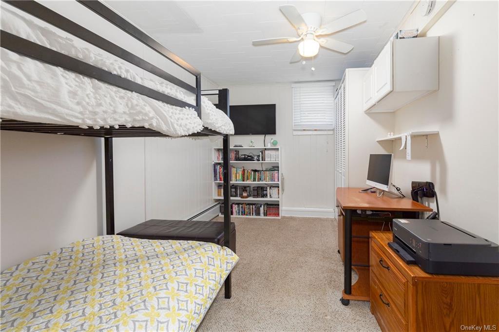 1030 Highway 199 Red Hook, NY 12571 - Photo 10 of 30 Carpeted bedroom featuring ceiling fan