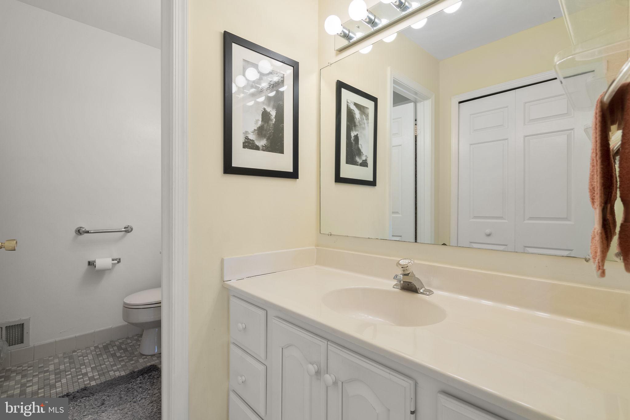 4404 Rendale Court Olney, MD 20832 - Photo 14 of 32 a bathroom with a sink and a toilet