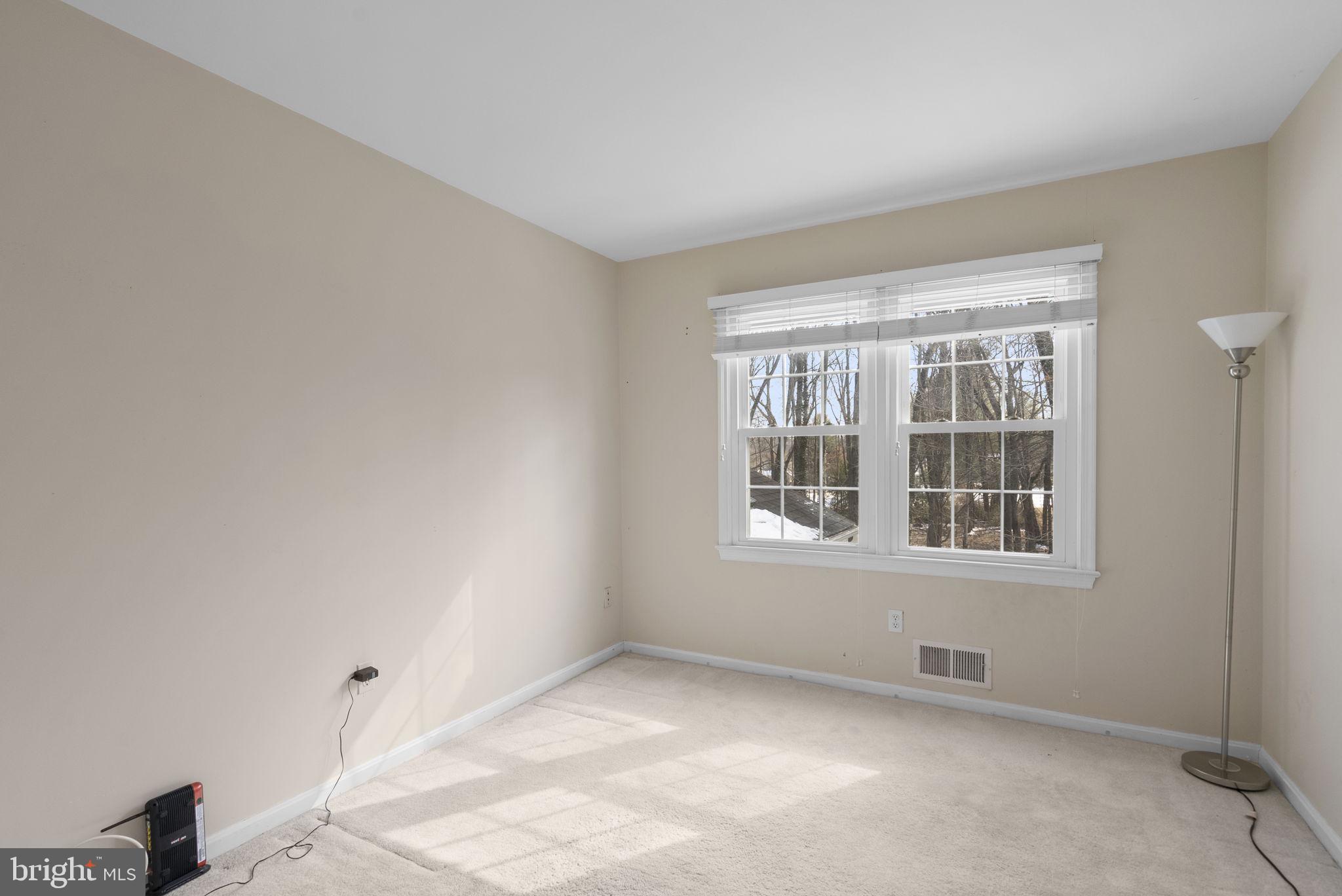 4404 Rendale Court Olney, MD 20832 - Photo 16 of 32 a view of an empty room with a window
