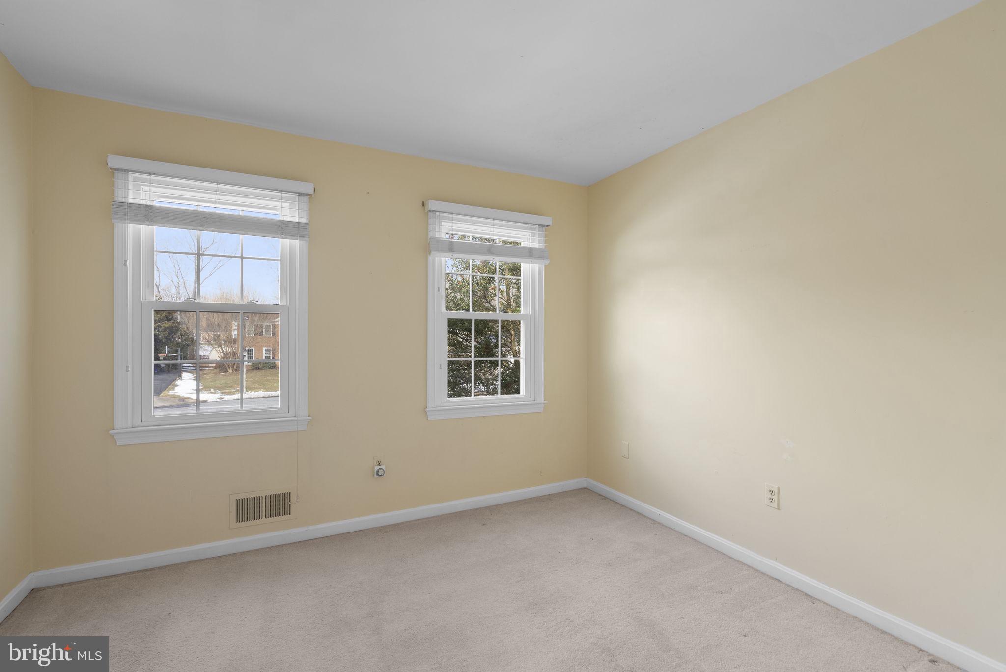4404 Rendale Court Olney, MD 20832 - Photo 18 of 32 an empty room with windows