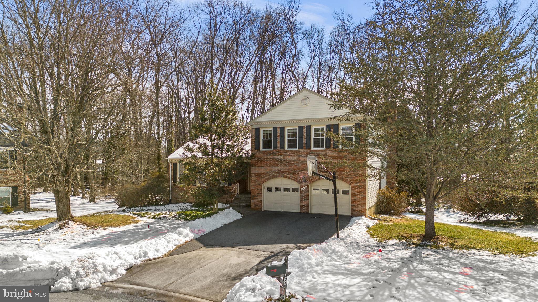 4404 Rendale Court Olney, MD 20832 - Photo 2 of 32 a front view of a house with a yard