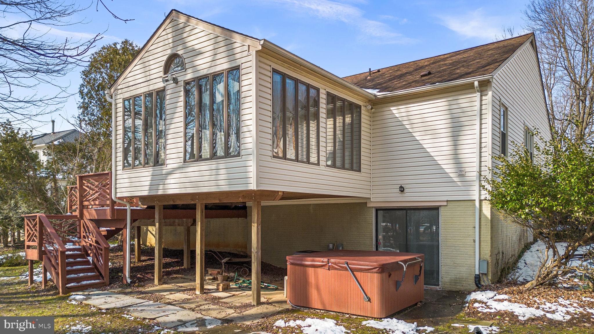 4404 Rendale Court Olney, MD 20832 - Photo 27 of 32 a front view of a house with parking