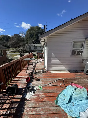 a view of a balcony with chairs